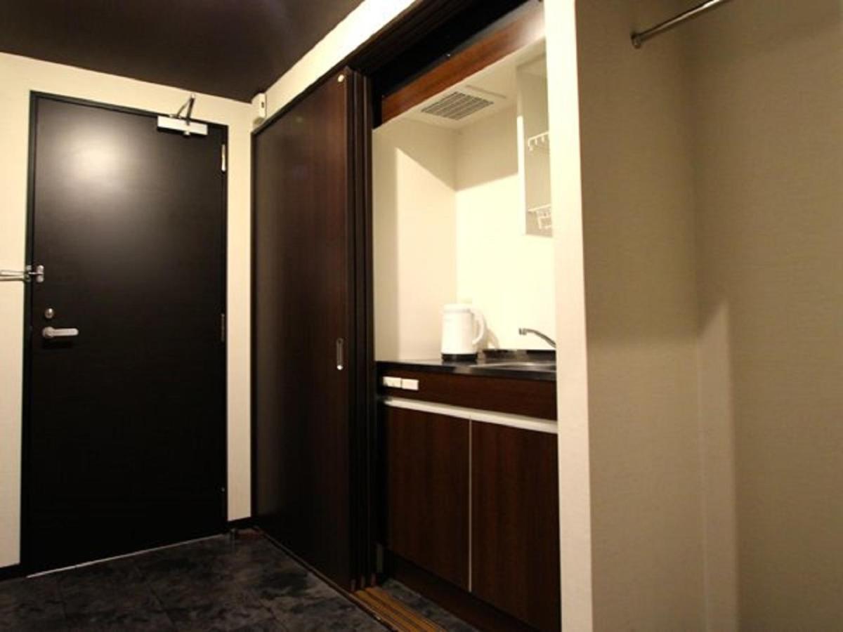 Hotel Livemax Budget Esaka Suita Bagian luar foto