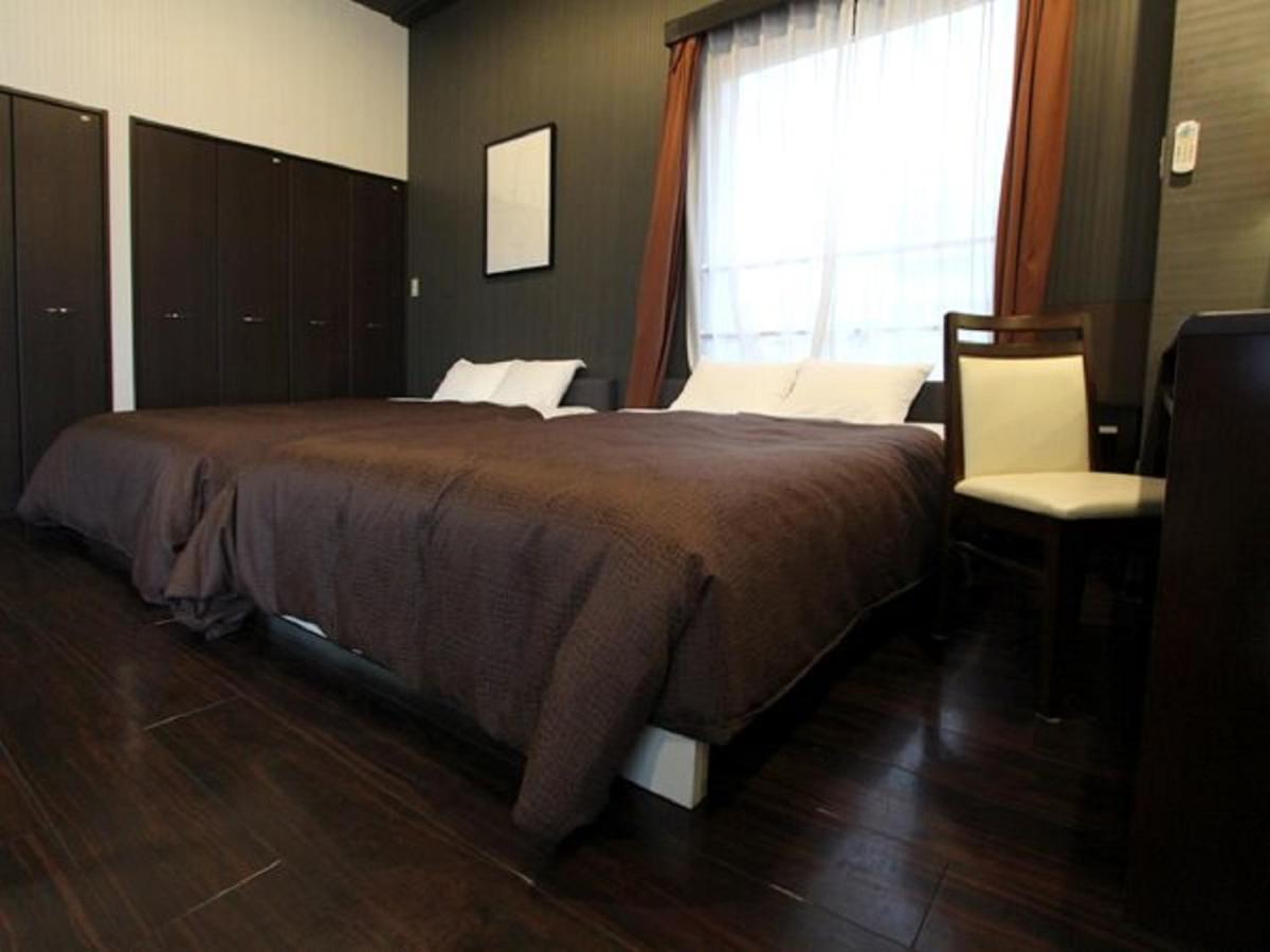 Hotel Livemax Budget Esaka Suita Bagian luar foto