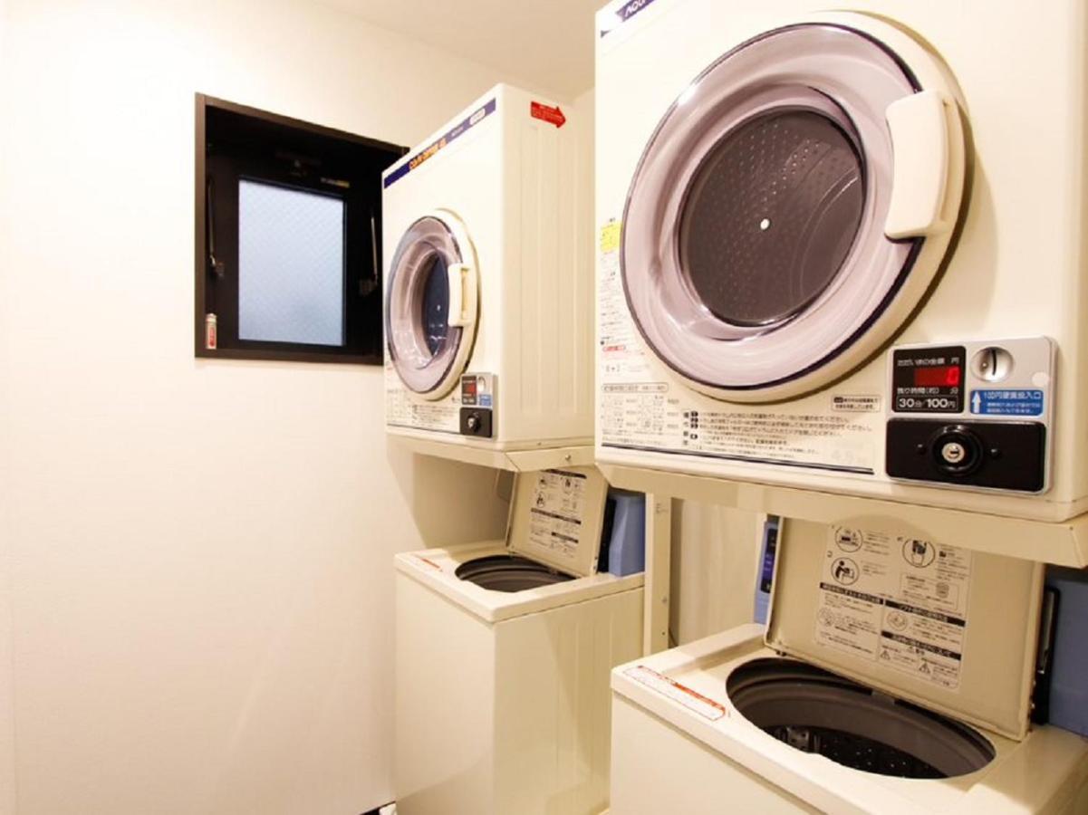 Hotel Livemax Budget Esaka Suita Bagian luar foto