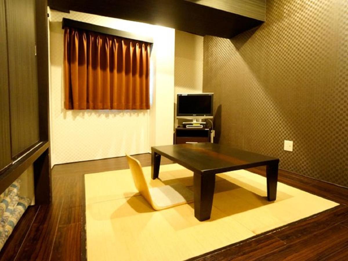 Hotel Livemax Budget Esaka Suita Bagian luar foto