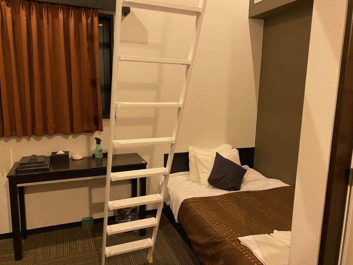Hotel Livemax Budget Esaka Suita Bagian luar foto