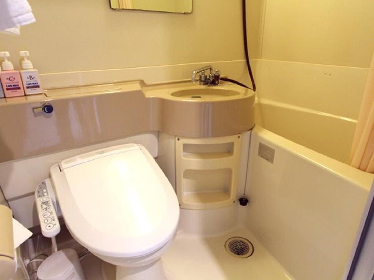 Hotel Livemax Budget Esaka Suita Bagian luar foto