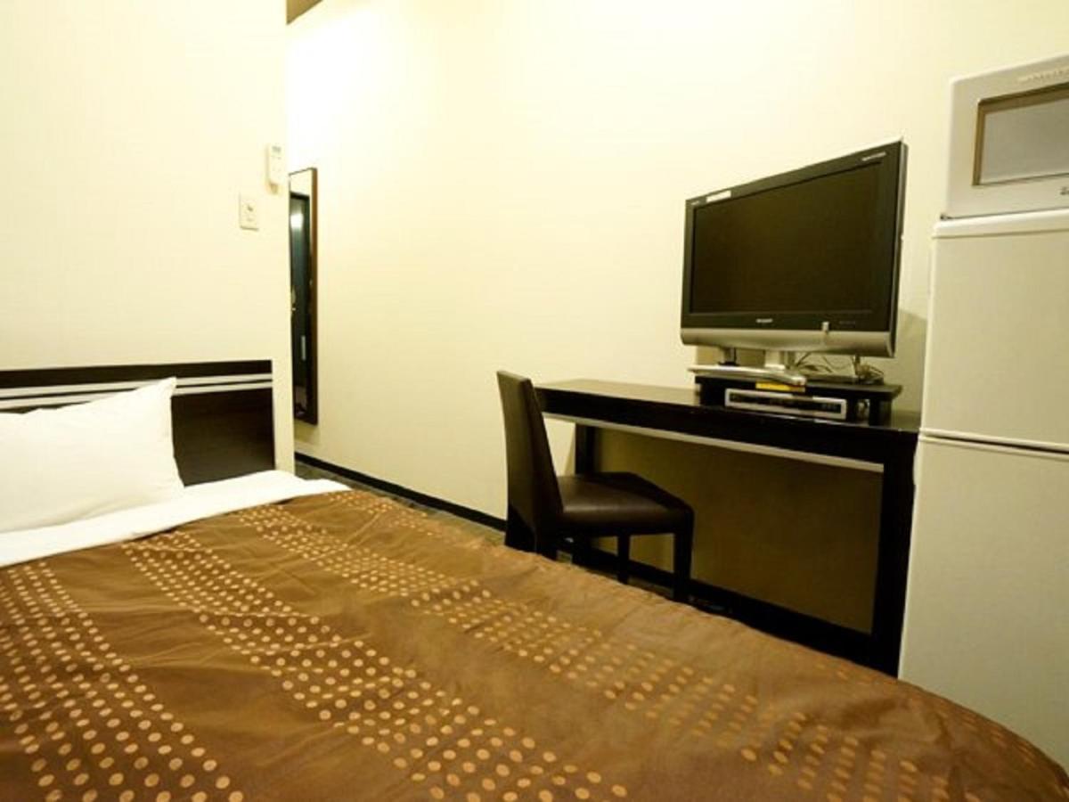 Hotel Livemax Budget Esaka Suita Bagian luar foto