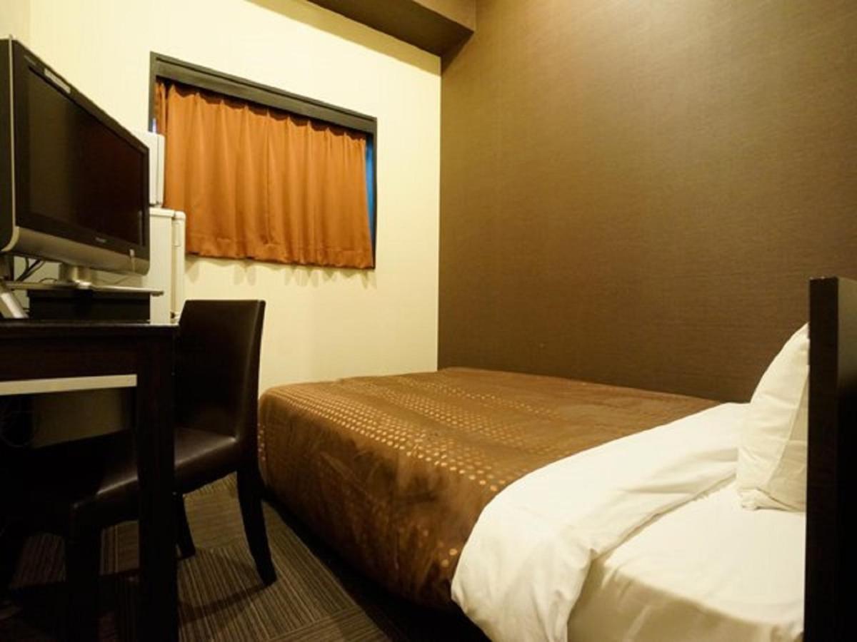 Hotel Livemax Budget Esaka Suita Bagian luar foto