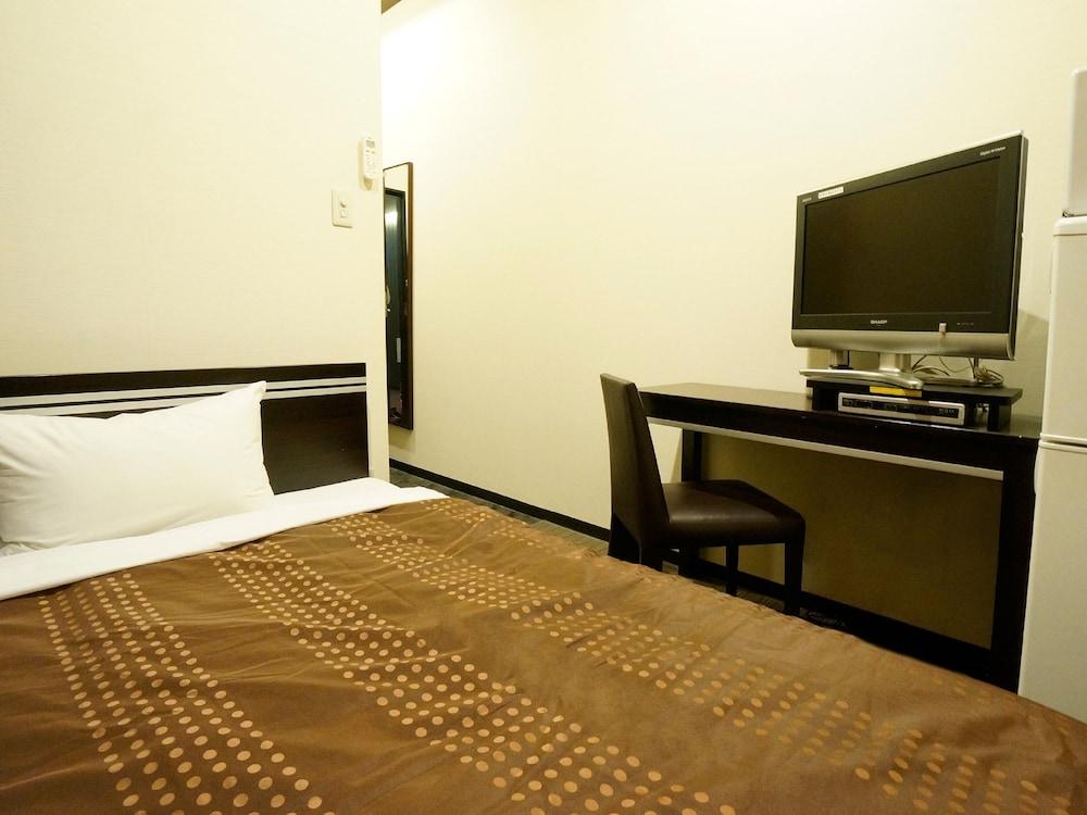 Hotel Livemax Budget Esaka Suita Bagian luar foto
