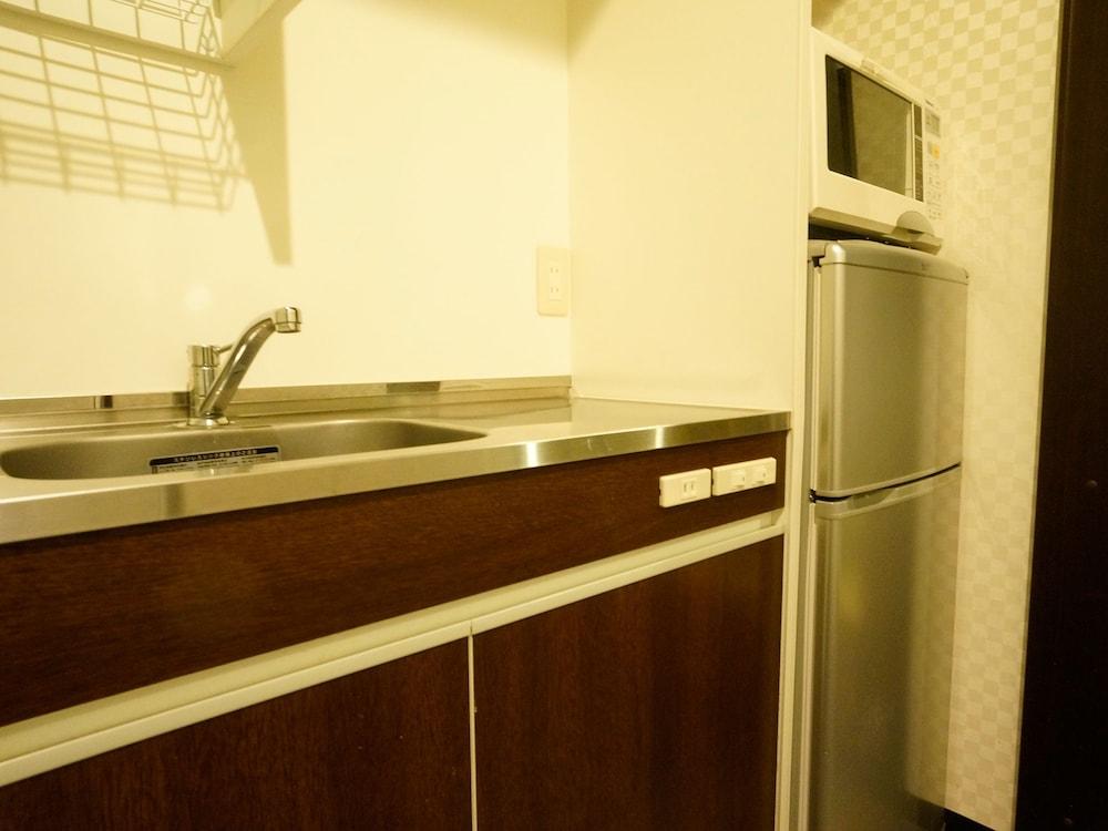 Hotel Livemax Budget Esaka Suita Bagian luar foto