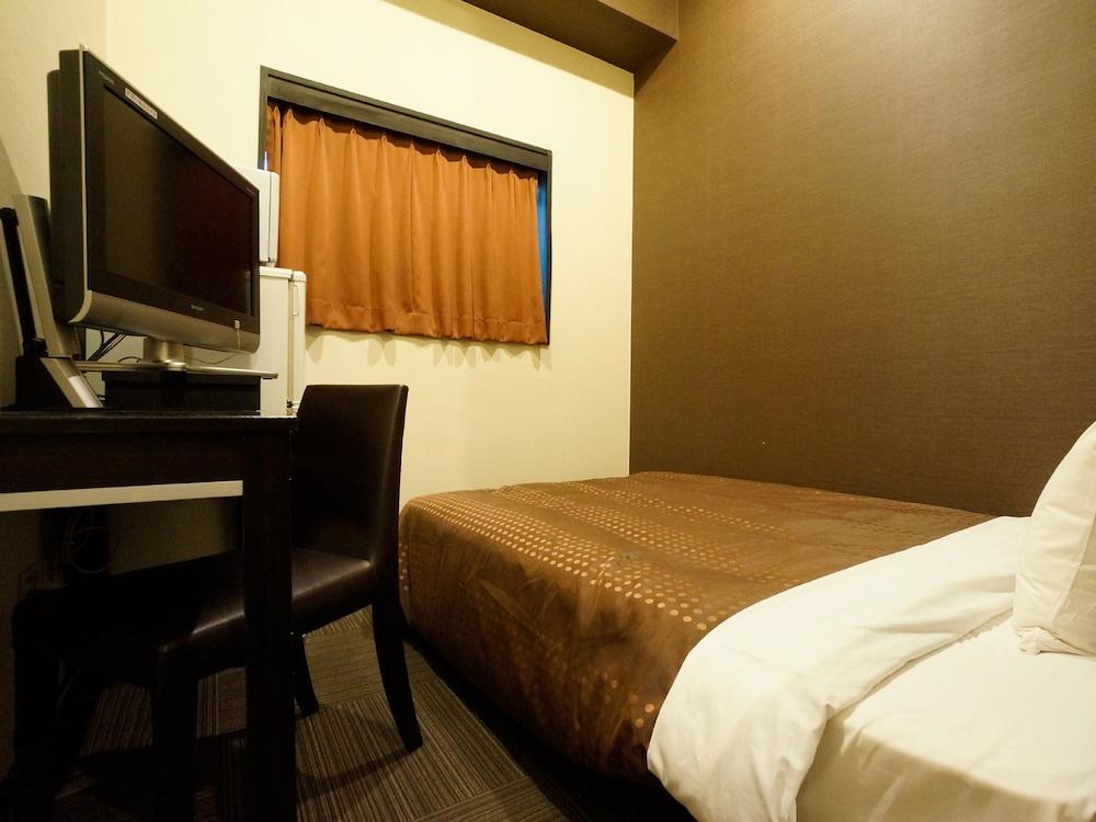 Hotel Livemax Budget Esaka Suita Bagian luar foto